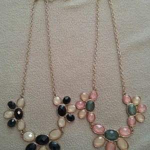 Flower necklaces .1 black & ivory..1 pink & ivory
